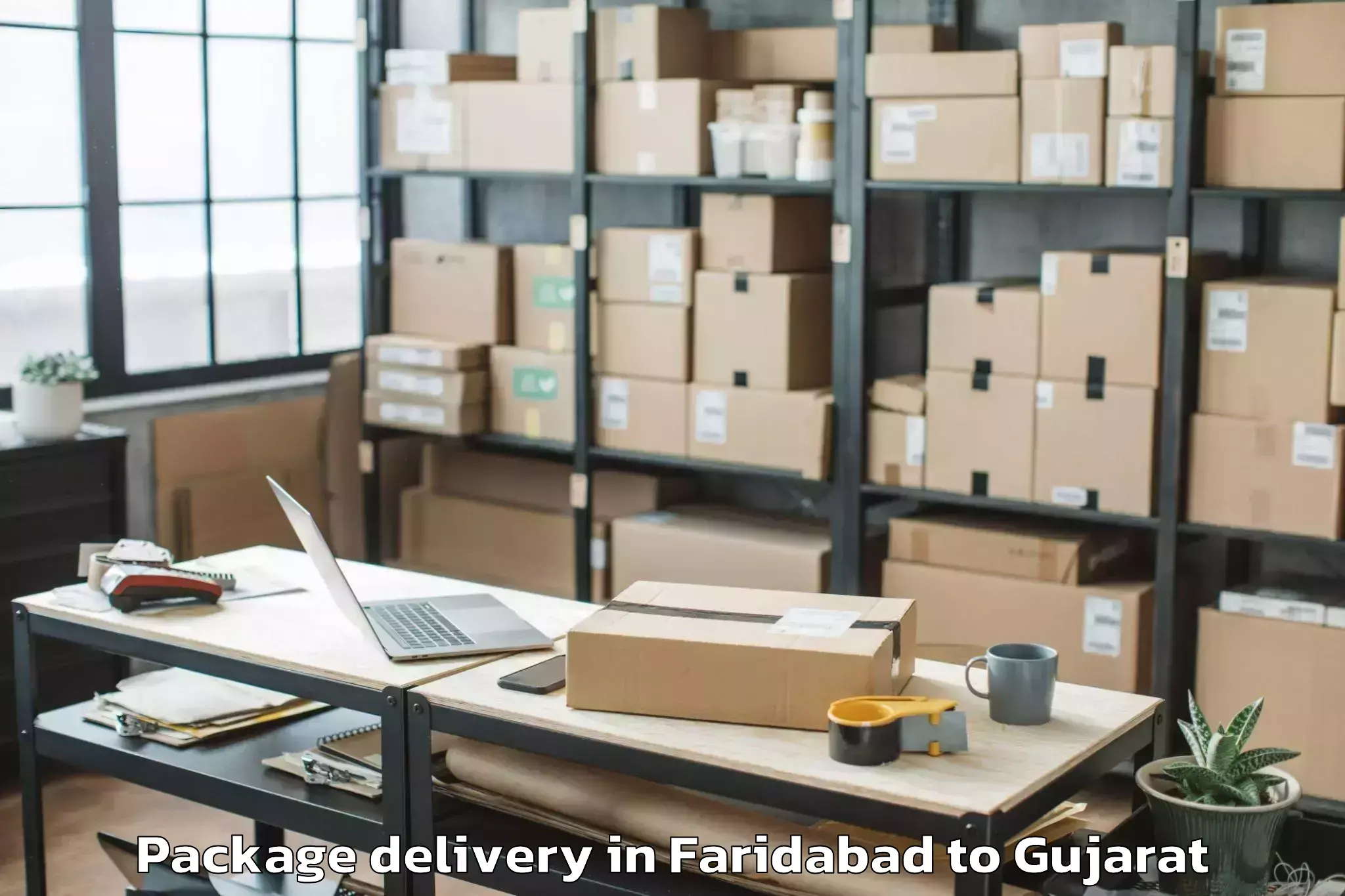 Book Faridabad to Keshod Airport Ixk Package Delivery